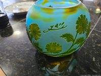Overall view of cameo glass bowl showing blue ground, green floral overlay and Gallé signature