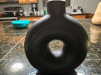 front view showing donut shape and central hole