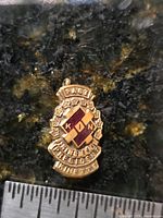 Front view showing enamel design and text