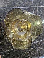 Top view of large bowl showing amber glass and wavy rim