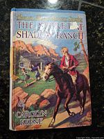 Front dust jacket of Nancy Drew "The Secret at Shadow Ranch"