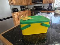 angled view of closed lunch box showing color scheme and handles