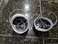 Overhead view of both tumblers showing interiors and swirl pattern