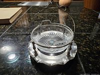 Full view of assembled butter dish showing stand, handle, glass liner