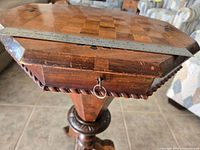 Edge of top with drawer and rope-twist trim