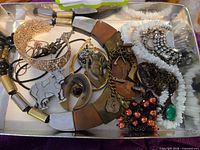 Tray overview of assorted jewelry pieces