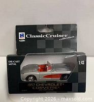 Front of boxed 1957 Corvette model showing car and branding