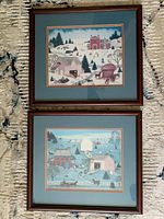 Both framed prints displayed together