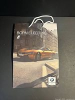 Front view of bag with BMW i8 image and Born Electric text