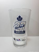 Front view showing Maple Leafs logo, number 27 and signatures