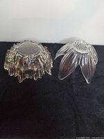 Underside view showing both glass dishes, highlighting textures and bases