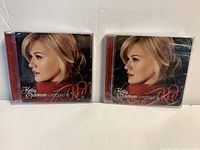 Front view of both sealed CDs