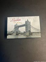 Lid showing Tower Bridge design and London text