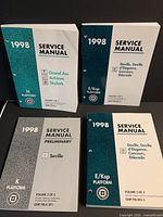 All four 1998 GM service manuals front covers visible