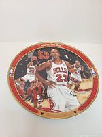 Front view of Michael Jordan limited-edition ceramic plate showing artwork and gold-rimmed border