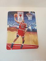 Front view of porcelain plate showing Michael Jordan artwork and banner