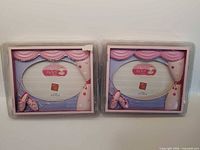 Front view of both sealed ballet-themed picture frames