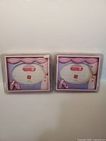 Both sealed Russ A Time To Dance picture frames front view