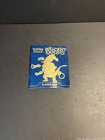 Front cover of Pokémon Ancient Origins Player Guide booklet