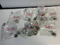 Group of sealed Richelieu knob packages