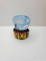 Front view showing BEHEMOTH text and coaster graphic