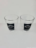 Front view of both Brennivin shot glasses