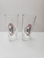 Both Jose Cuervo tall shooter glasses front view