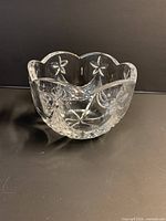 Side view of Mikasa Stardust crystal bowl showing scalloped rim and cut star pattern
