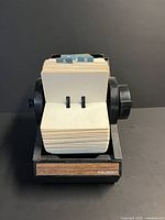 Front view showing blank cards and A–B index tabs on rotary file