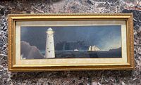 Front view of framed lighthouse artwork
