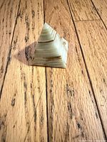 Angled view of polished onyx pyramid