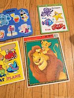 Group shot of all four puzzles on floor