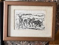 Overall view of framed black-and-white deer print