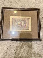 Front view of framed print showing artwork, matting and frame