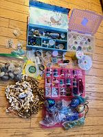 All items laid out showing storage boxes, containers, spools, strands and baggies
