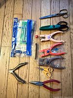 All hand tools laid out on floor