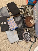 Group shot showing all small purses, wristlets and wallets