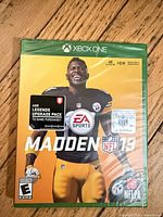 Front of sealed Xbox One Madden NFL 19 game case