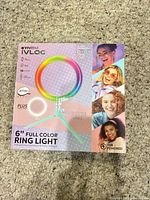Front of boxed Vivitar iVlog 6" full color ring light
