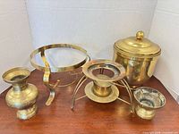 Group shot of all five brass items