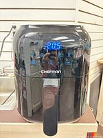 Front view showing digital display and controls