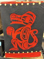 Full view of wall hanging showing wolf motif, buttons and trim