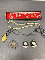 Group shot showing all five jewellery pieces