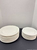 Stacked dinner and side plates showing quantity and pattern