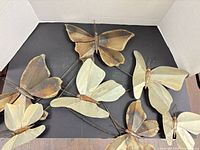 Entire metal butterfly wall hanging viewed from above