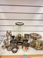 Group shot showing all metalware items on shelf