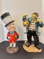 Both figurines side by side for scale and detail