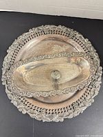 Full view of round tray with insert dish showing overall design