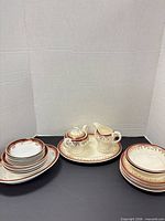 Group view showing platter, creamer, sugar, side plates and bowls