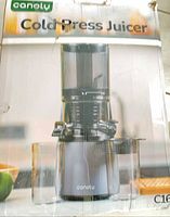 retail box showing Ganoly cold press juicer and model information